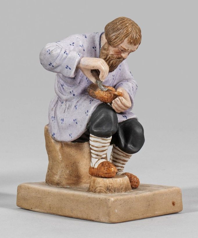 Russian shoemaker made of biscuit porcelain
