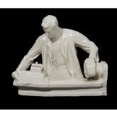 A Soviet porcelain group "Workman at the lathe", attributed to Dulevo Porcelain Manufactory, Dulevo, early 20th century