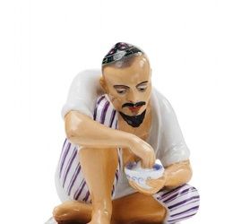 Uzbek man eating pilaf A realistically painted figure of a man crouching on a rug, eating the