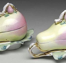 PAIR OF RUSSIAN PORCELAIN PEAR FORM COVERED CONDIMENTS.