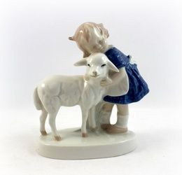 The girl with the little sheep.