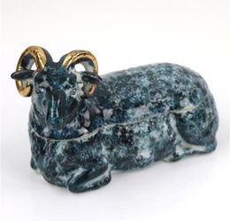 Kuznetsov Imperial Russian porcelain figural animal covered dish or box in the form of a recumbent ram.