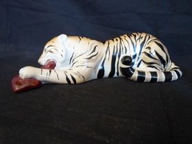Tiger with meat (there is a crack).
