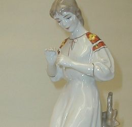 Vintage USSR Kiev porcelain figure of girl with daisy, 1960's-70's, 12" tall