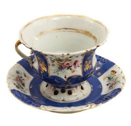 A KUZNETSOV PORCELAIN CUP AND SAUCER LATE 19TH C