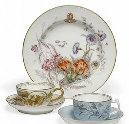 A RUSSIAN PORCELAIN SOUP-PLATE AND TWO CUPS AND SAUCERS