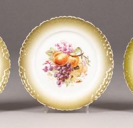 Three plates with a fruit pattern from MS Kuznetsov