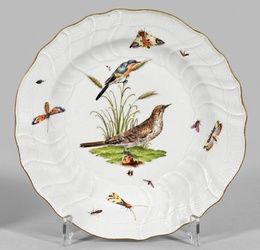 Decorative plate with bird and insect motif