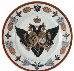 A RUSSIAN PORCELAIN PLATE WITH IMPERIAL HERALDRY,