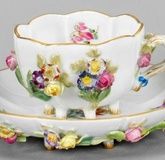 Decorative cup with flower design