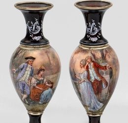 A pair of enamel vases with gallant couples.