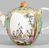 Meissen teapot with turquoise background and Watteau scene.
