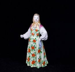 Soviet porcelain figure of a dancing woman “Masha”. Dulevo, 1960s. Height: 20.6 ...