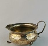 890 silver pitcher with a beautiful handle