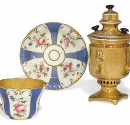 A RUSSIAN PORCELAIN SUGAR-BOWL AND A CUP AND SAUCER