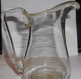 Ancient, beautiful milk pitcher