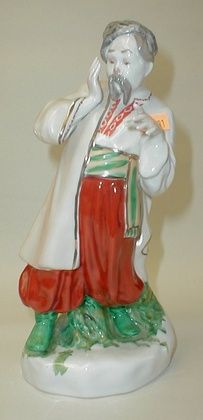 Винтажная киевская фарфоровая фигурка "Украинец" СССР 1960-70-х годов "Одарка" высотой 9,5 дюйма.