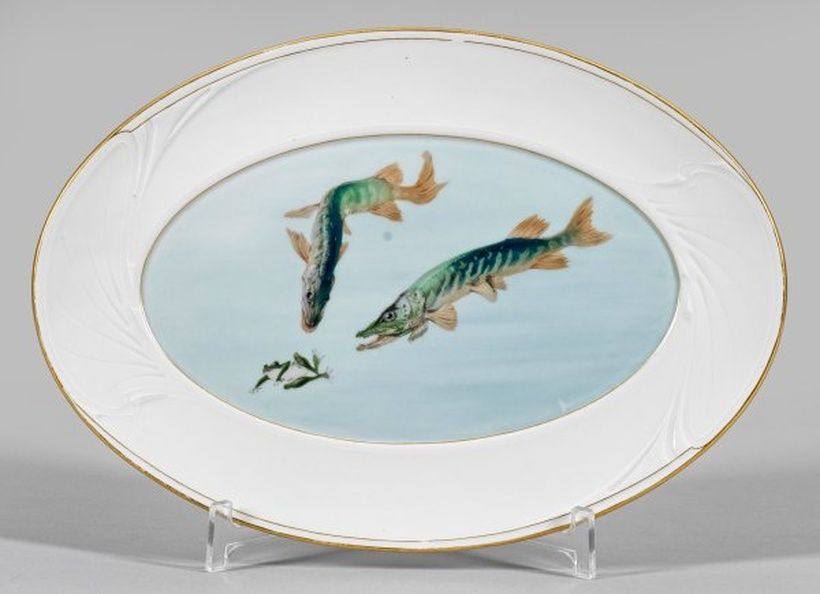 Art Nouveau plate with pike and frog motifs.