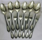 A set of 6 silver forks and spoons in the Empire style.