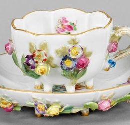 Decorative cup with flower design
