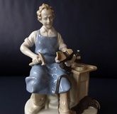 Porcelain figure of a cobbler