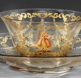 Decorative bowl with saucer and Commedia dell'arte decor.