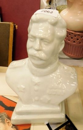 A Dulevo style hollow porcelain bust of Stalin, undecorated, 24cm high.