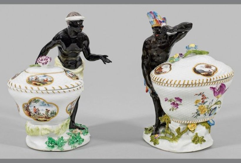 A pair of Meissen Moorish figures with spice bowls.