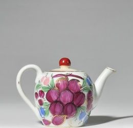Small teapot in white porcelain with polychrome...