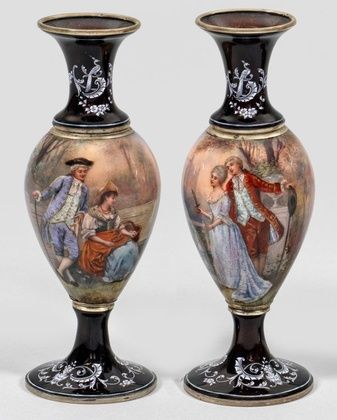 A pair of enamel vases with gallant couples.