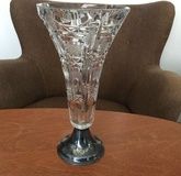 CRYSTAL VASE ON A SILVER STAND FROM 1971.