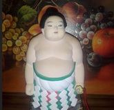 Japanese figurine Sumo wrestler Sumo in ceremonial attire with a katana by Hakata workshop.