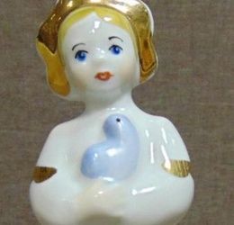 Porcelain figurine of the USSR. Girl with a dove. Moscow Youth Festival 85.