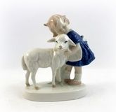 The girl with the little sheep.
