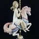 Figure Girl on the Carousel Horse
