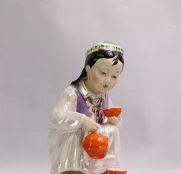 Uzbek woman with a teapot
