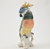 Parrot figurine.