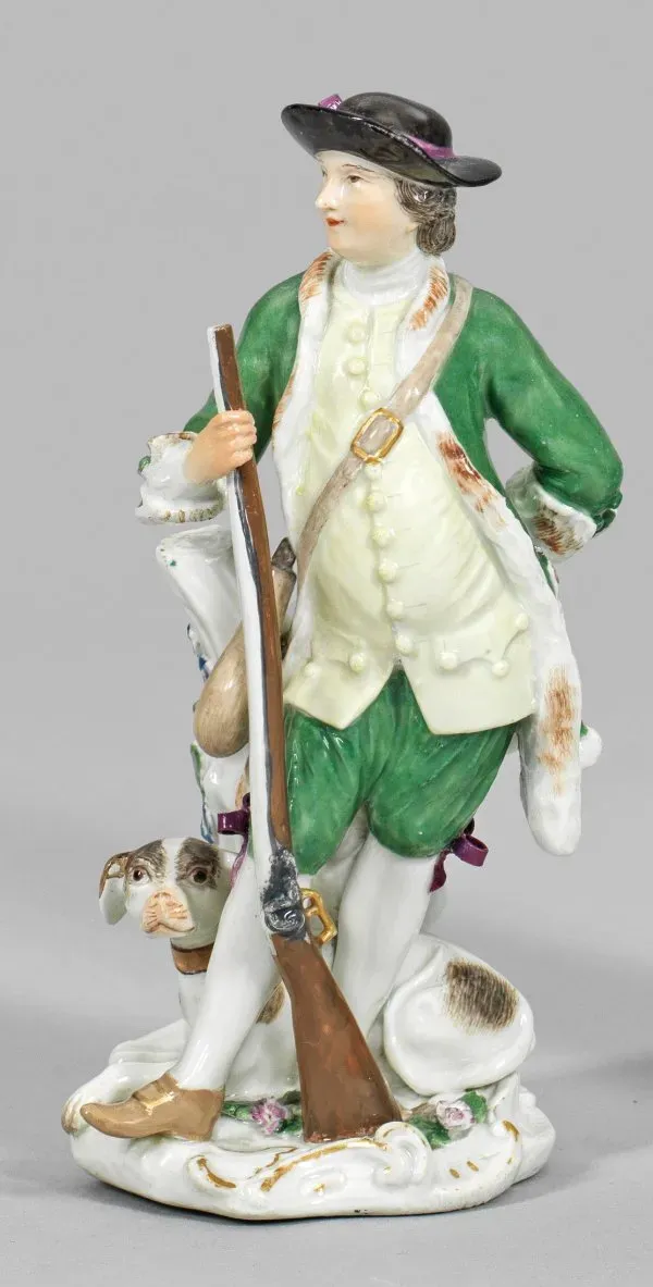 Охотник с ружьем и собакой